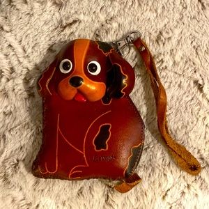 Geniune Leather zippered man made dog shape change purse stamped in Las Vegas